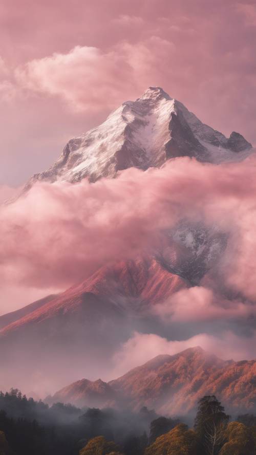 Un paisaje surrealista que muestra nubes de color rosa pastel alrededor de la imponente cima de una montaña.