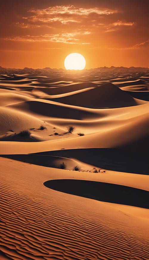 Matahari oranye terbenam di balik gurun yang luas, menimbulkan bayangan gelap dan panjang.