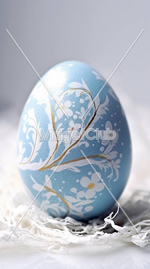 עיצוב ביצת פסחא פרחונית כחול לבן