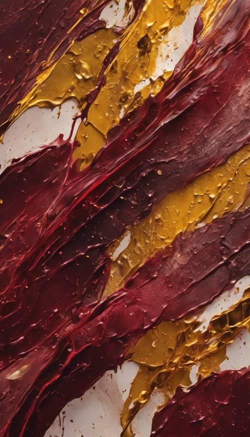 A heavily textured abstract image with bold, broad strokes and splashes of maroon and gold.