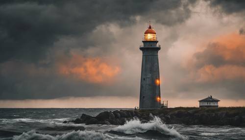 A towering lighthouse, painted gray and orange, against a stormy sky.