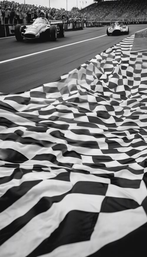 Una bandera a cuadros en blanco y negro ondeando al viento en la línea de meta de una carrera de autos.