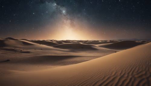 밤에는 별이 가득한 사막 하늘, 별빛 아래에는 모래 언덕이 보입니다.