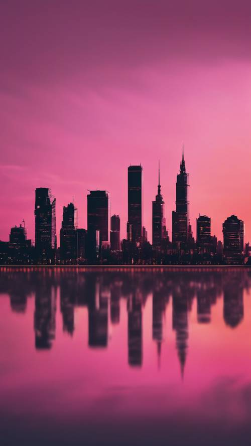 Panoramę miasta o zachodzie słońca, zabarwioną na odcienie ciemnego różu