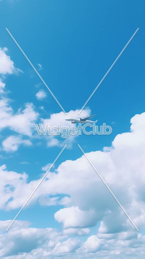 푸른 하늘 높이 날아가는 비행기
