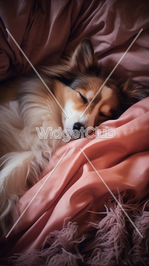 やわらかなピンクのシーツの上で眠る犬