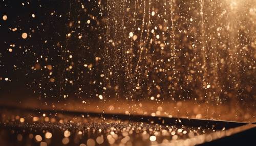 Glitter marrom chovendo em um palco mal iluminado representando uma cena dramática de performance.