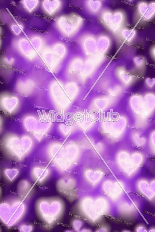 紫色のハートが光る壁紙