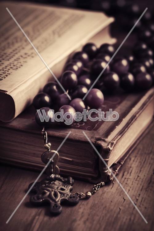 Vintage Book and Beads on Wooden Table