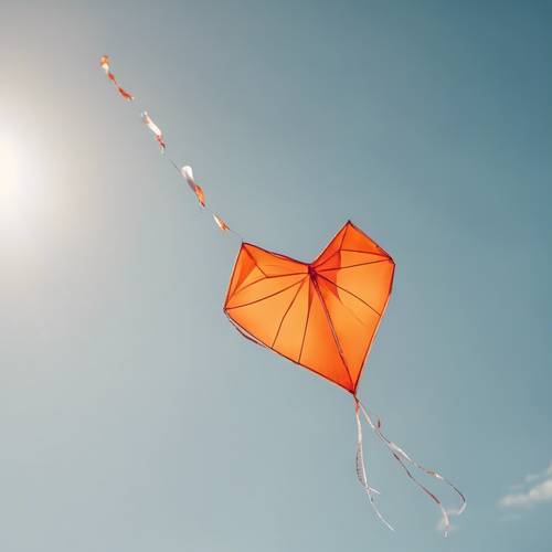 An orange heart-shaped kite flying merrily on a sunny day.