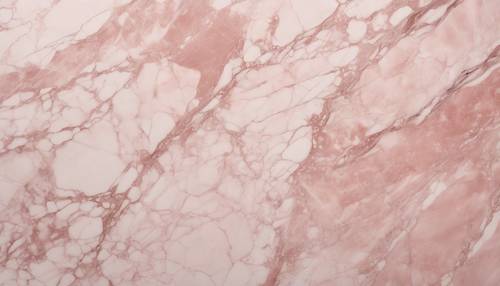 Uma superfície lisa e polida de mármore rosa pastel com veios delicados.