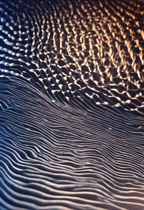 Formazioni ondulate astratte modellate su una brillante tela blu scuro.
