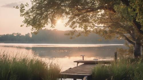 The phrase 'Every accomplishment starts with the decision to try' on an image of a peaceful lake at sunrise. Tapeta [f37c859162a24bb79d5b]