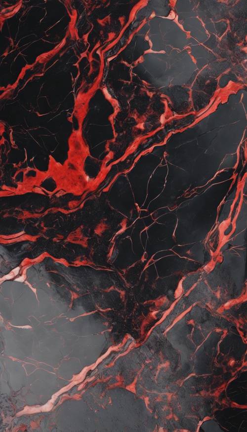 Kawałek błyszczącego czarnego i czerwonego marmuru o skomplikowanych wzorach