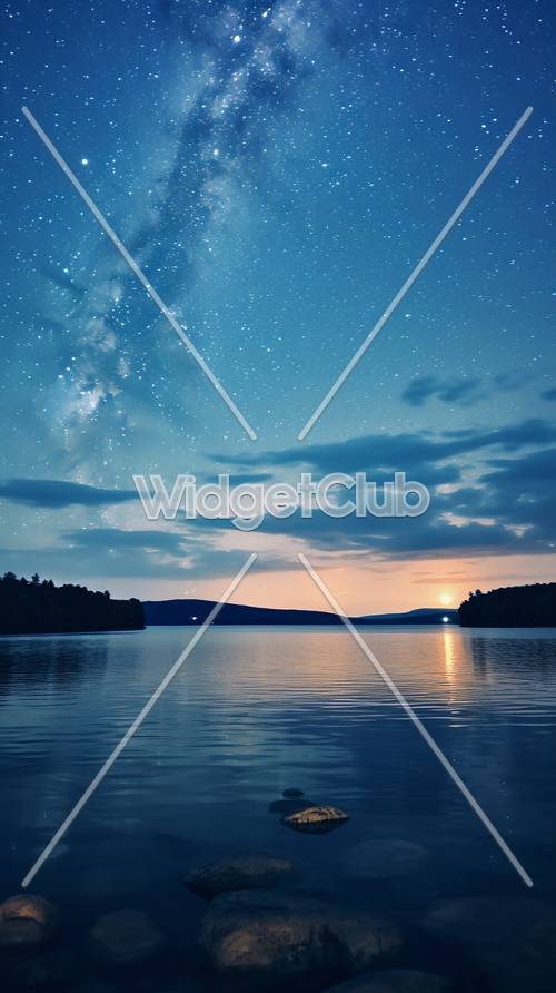 Starry Night Sky Over a Peaceful Lake at Sunset