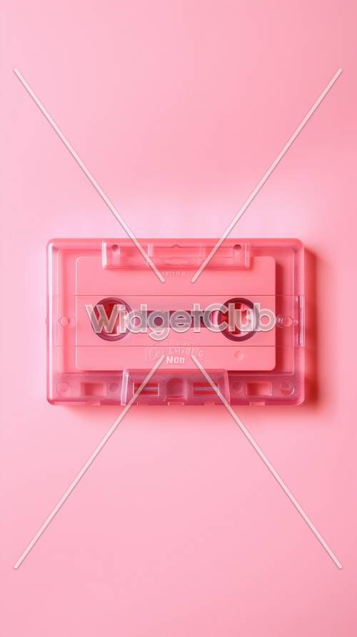 ピンクのカセットテープがピンクの背景に映える壁紙