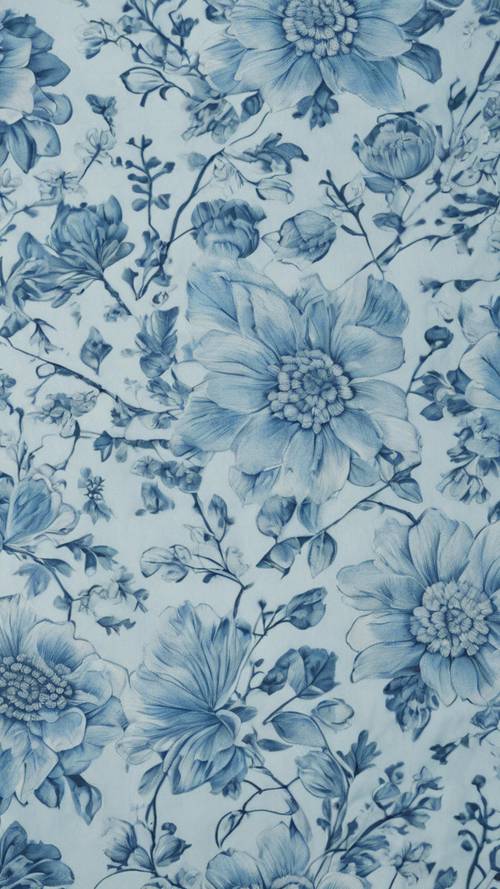 Eine Nahaufnahme eines hellblauen Blumenmusters, das auf glatten Baumwollstoff gedruckt ist.