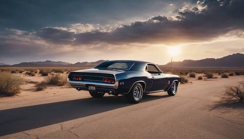 A dark navy classic American muscle car cruising down a desert highway at sunset.”
