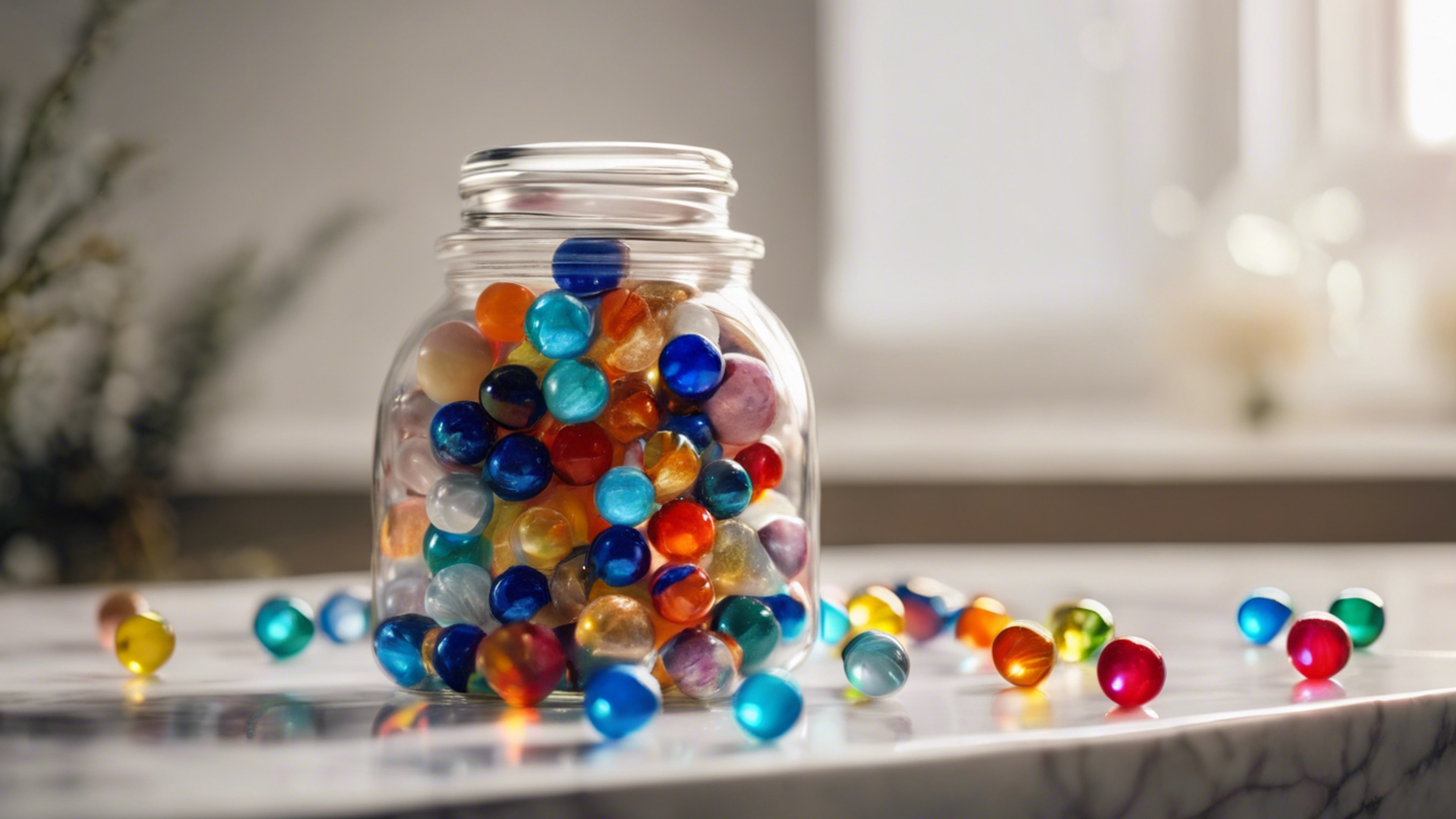 A glass jar full of colorful marbles with glinting lights around them, placed on a white marble surface. Tapetai[9438bf9259b84d3ca042]
