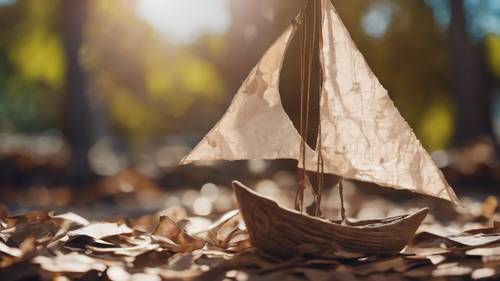 Một cánh buồm giấy tạm bợ được treo trên một con tàu hình vỏ cây trong sân chơi, gợi lên cảm giác tưởng tượng và vui chơi.