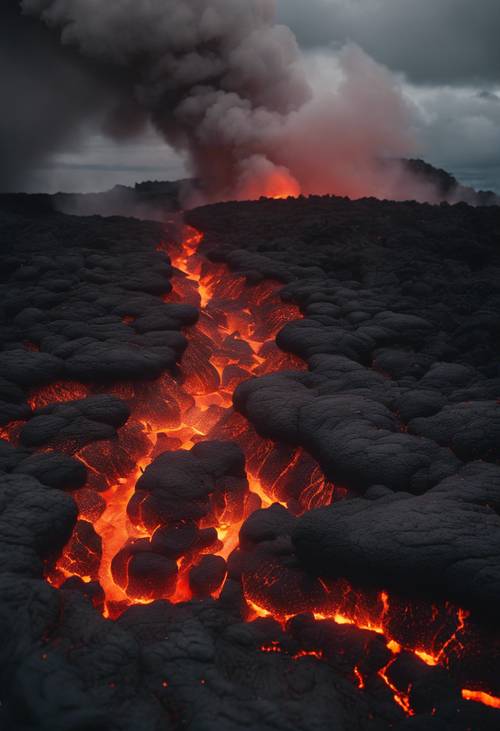 An eerie view of the glowing lava flow from the Kilauea volcano in the Big Island of Hawaii.