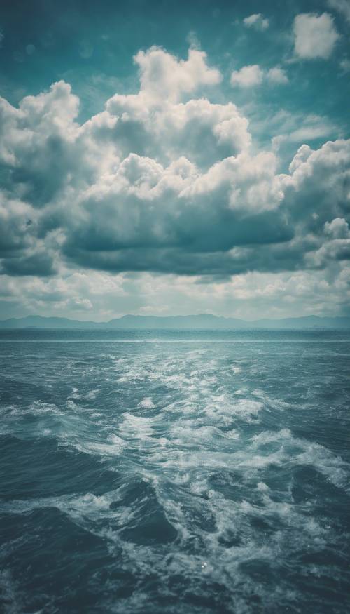 View of an expansive sea under cloudy sky exhibiting a blue grunge effect.