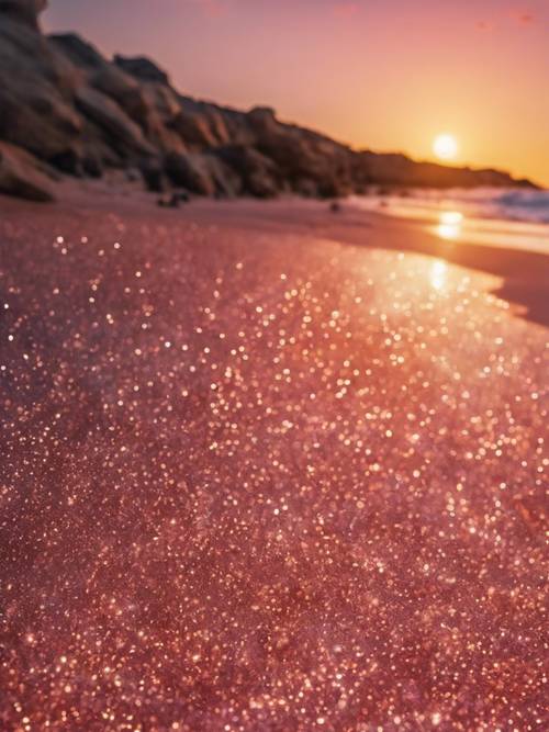 令人驚嘆的日落反射在玫瑰金閃閃發光的沙子上