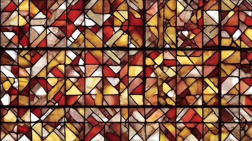 采用红色和黄色砖块重复图案的彩色玻璃设计。