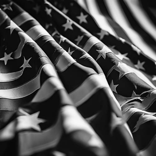 명예와 존경을 상징하는 접힌 흑백 미국 국기의 이미지입니다.