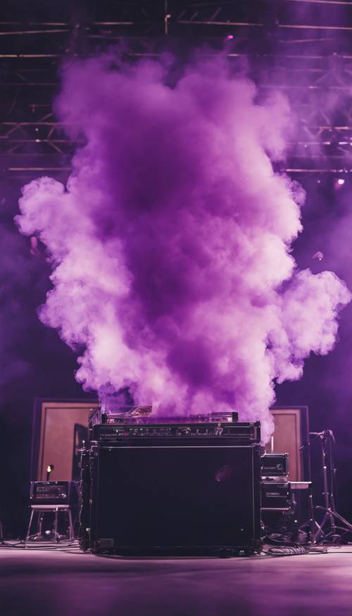 A burst of purple and lavender smoke from a stage smoke machine during a rock concert
