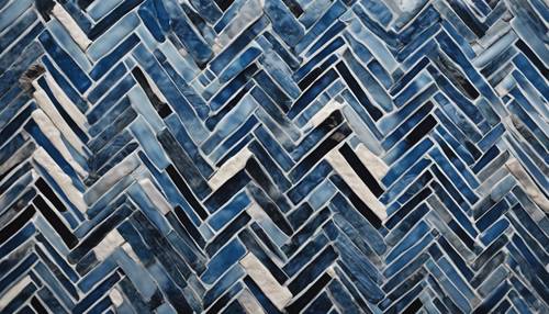 Gros plan d&#39;un motif à chevrons moderne sur des carreaux de céramique bleu foncé.