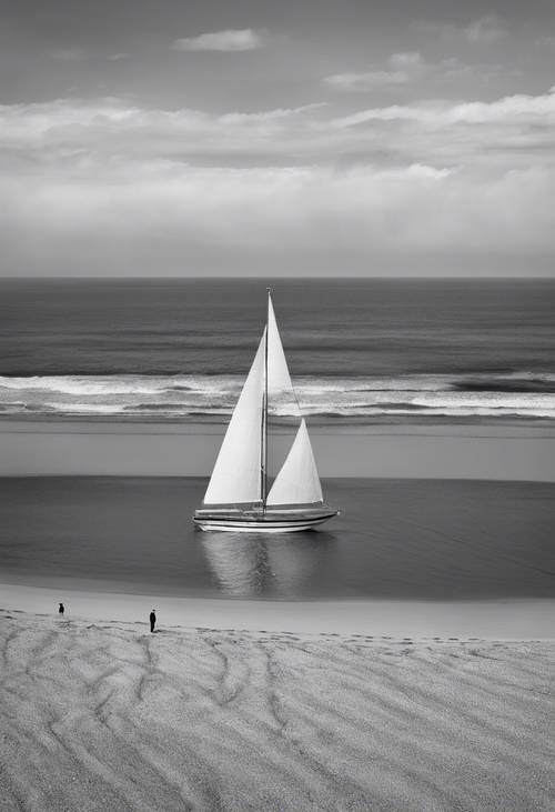 艺术黑白图像：一个人孤独地站在海滩上，一艘帆船停泊在远处的海洋地平线上。