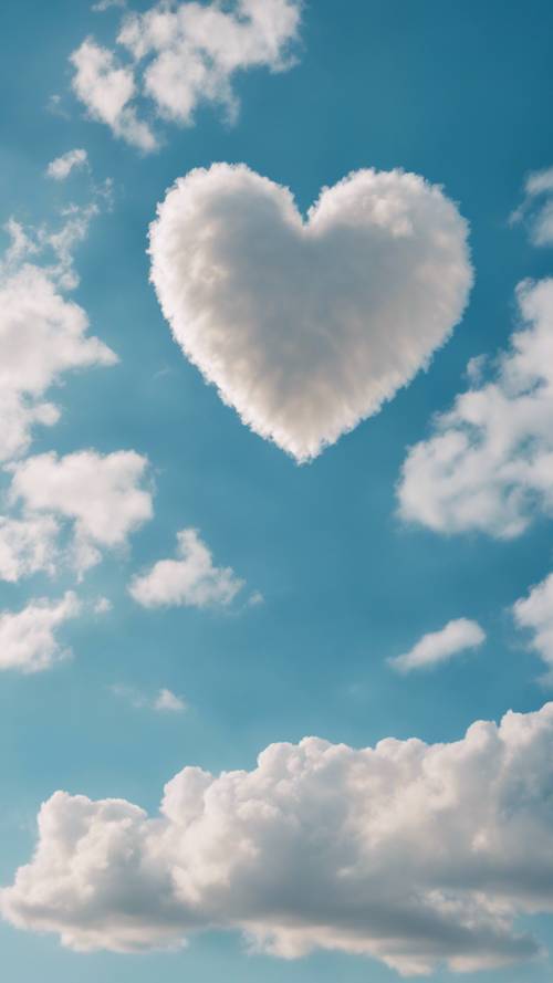 Uma nuvem em forma de coração pairando no céu azul brilhante da tarde.