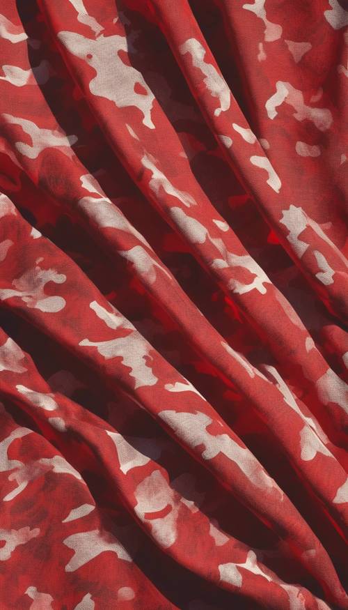 A large piece of fabric showcasing a red camouflage pattern set against a bright, afternoon sun.