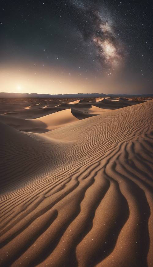 맑고 달빛이 비치는 밤하늘 아래 사막의 구불구불한 모래 언덕과 그 위로 수천 개의 별이 반짝입니다.