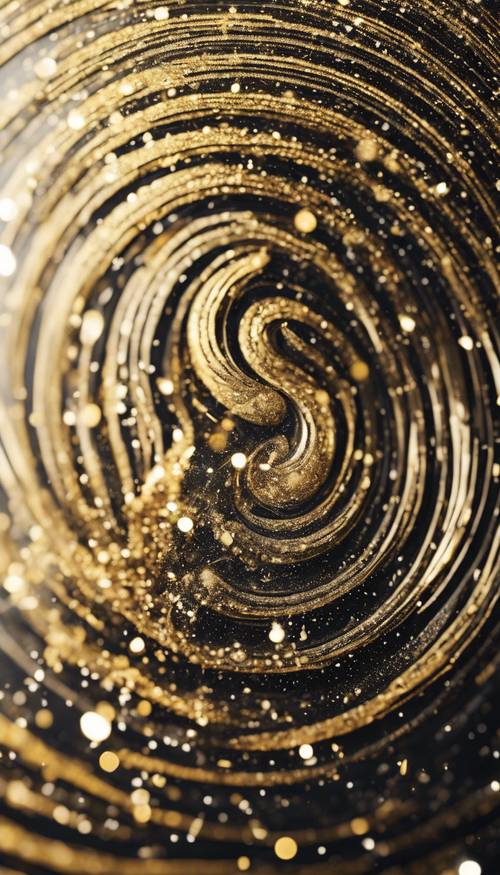 An abstract piece of black and gold glitter swirled into a vortex pattern