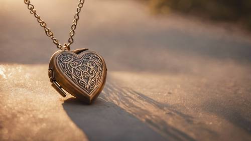 A burnished bronze heart-shaped locket catching the warm sunlight. Tapet [983412251e8342328d38]