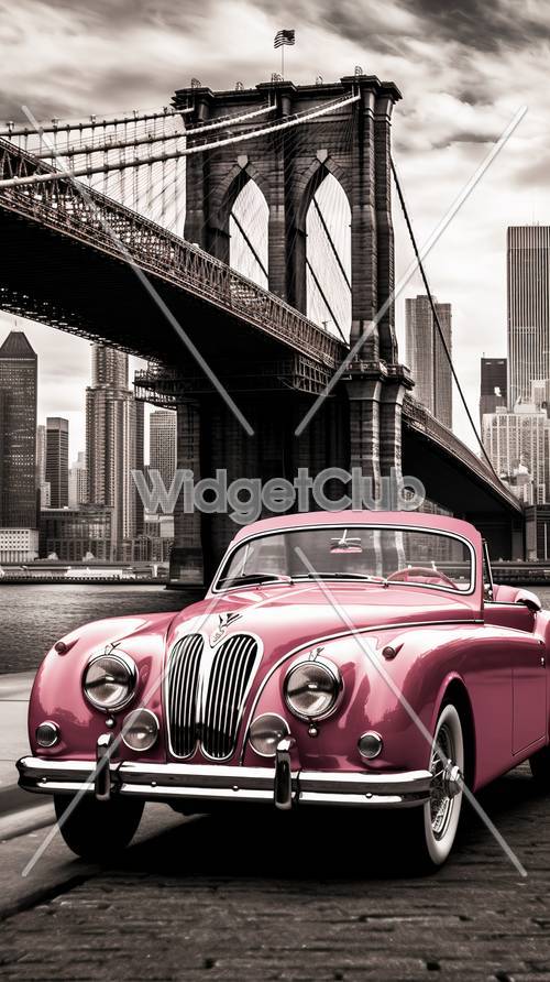 Coche vintage rosa junto al puente de Brooklyn