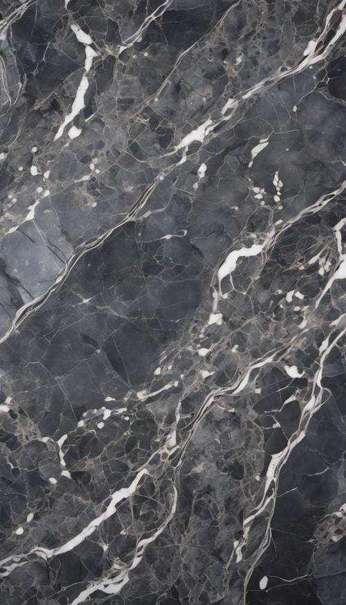 Close-up of dark gray marble texture, with intricate white patterns embedded throughout.