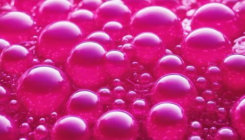 Um padrão psicodélico de bolhas rosa choque flutuando caoticamente.