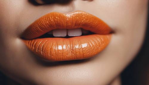 Primo piano delle labbra di una donna con un rossetto arancione sfumato.
