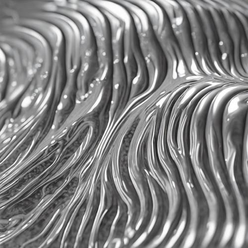 A metallic silver slime expanding into beautiful patterns on a sleek modern table.