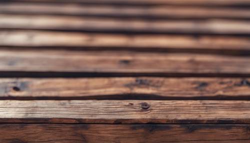Close up of brown wooden planks on an old ship. Tapeta [1c7abdbea2a04793969c]