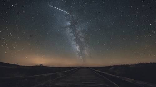 Un cielo notturno stellato con una stella cadente che passa e la frase &quot;Guarda sempre il lato positivo della vita&quot; incisa sulle stelle.