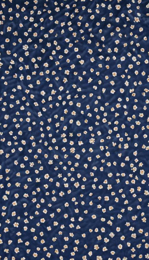A navy blue, textured fabric with a pattern of small flowers.