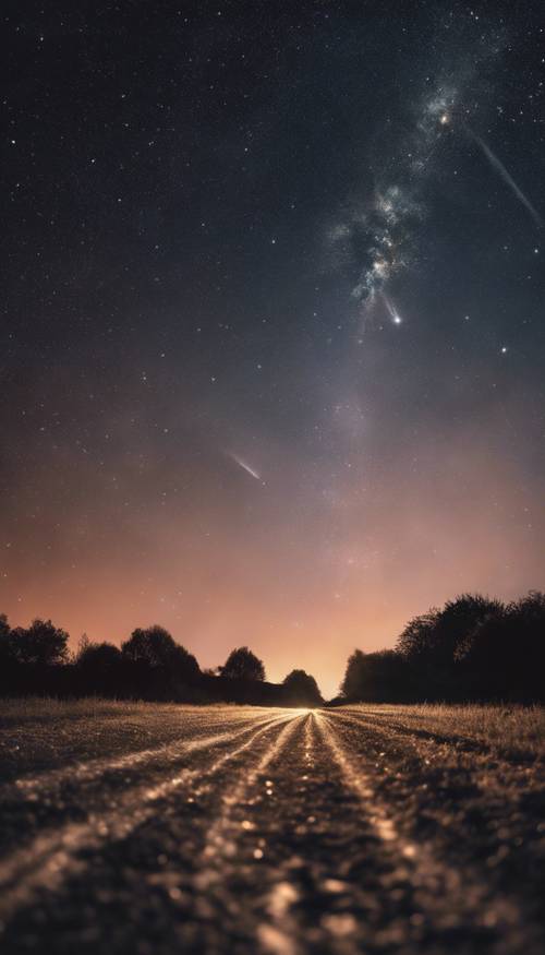 A shooting star, streaking across the darkened twilight in a trail of glowing dust. Tapeta [08339f8d74ce4516b967]
