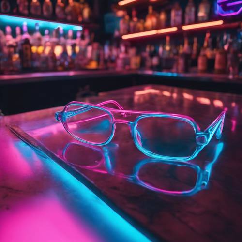 Pink and blue neon glasses illuminating a retro-themed bar table.