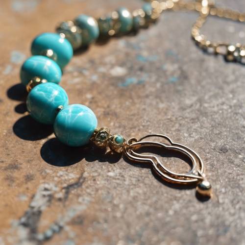 Turquoise marble necklace glinting in the morning sun. Tapet [d57866537e664c3ba469]