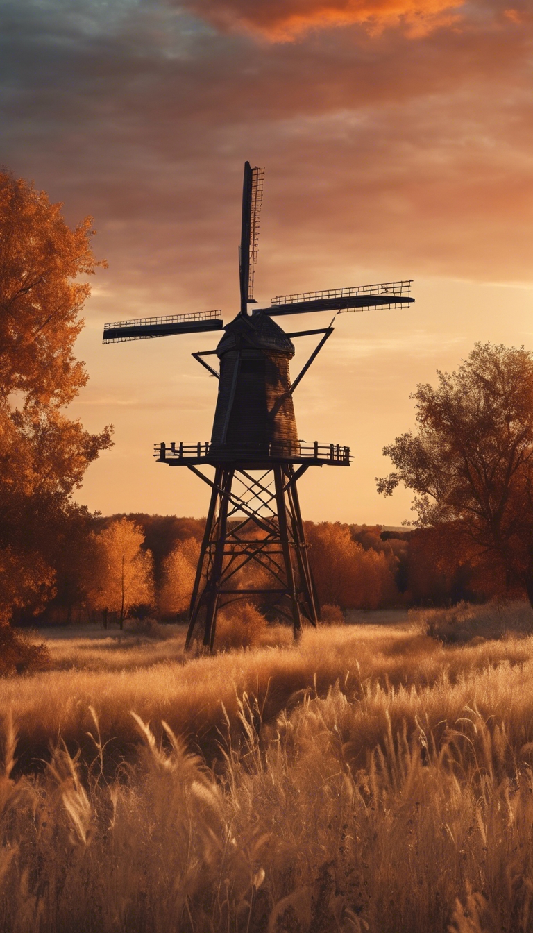 A windmill standing against the backdrop of a western sunset in the autumn. کاغذ دیواری[238d826786cc4a4ea518]
