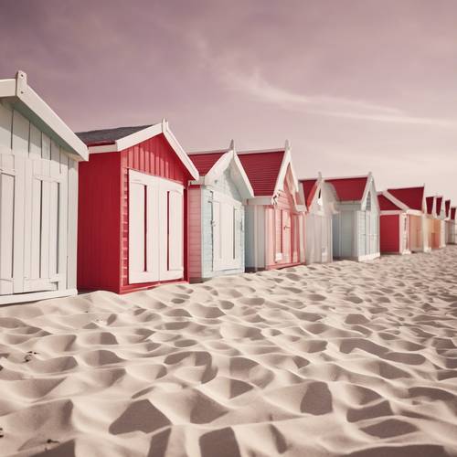 一排柔和的紅色和白色海灘小屋。